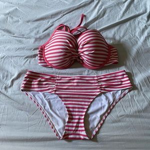 Pink, white, and gold striped swim suit
